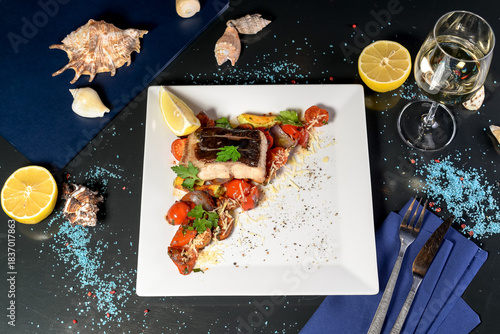 salad with grilled fish and cherry tomatoes with cheese