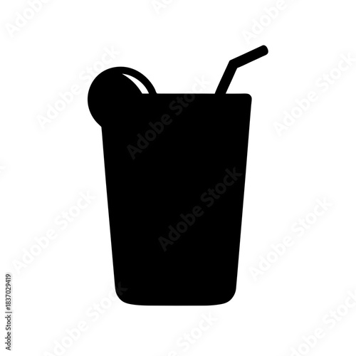 Silhouette of a refreshing drink in a glass with a straw and fruit slice