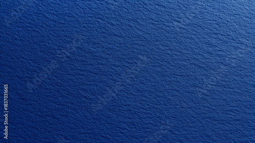 深みのある青色の紙のテクスチャ背景