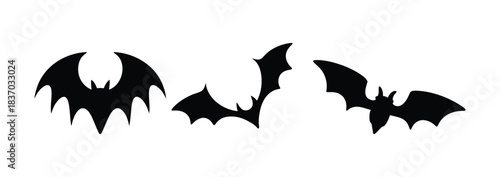 Collection of silhouetted flying bats 