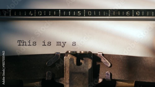 Retro typewriter writing THIS IS MY STORY. Start of a new story with vintage typewriter.