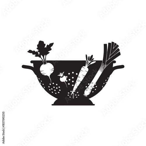 Black silhouette colander with root vegetables and leek