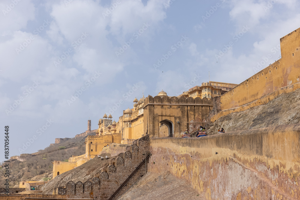 Fototapeta premium Architecture view of amber fort or amer fort palace of jaipur. Amber fort is a famous tourist destination of rajasthan. Tourists from entire world travel to amber fort and witness the palace.