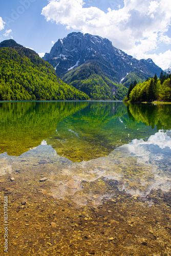 A magnificent landscape of Lake Del Predil (lago Del Predil) in Italy. Beautiful alpine lake, surrounded by Julian Alps. 