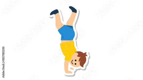 A young boy with brown hair wearing a yellow t-shirt and blue shorts performs a handstand with his legs in the air on a black background illustration