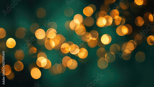 Abstract background of warm golden bokeh lights on a deep teal and green backdrop, creating a festive, blurry glow.