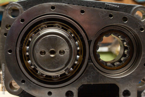 Obraz na płótnie Disassembled industrial compressor or pump housing, revealing two large, precisi