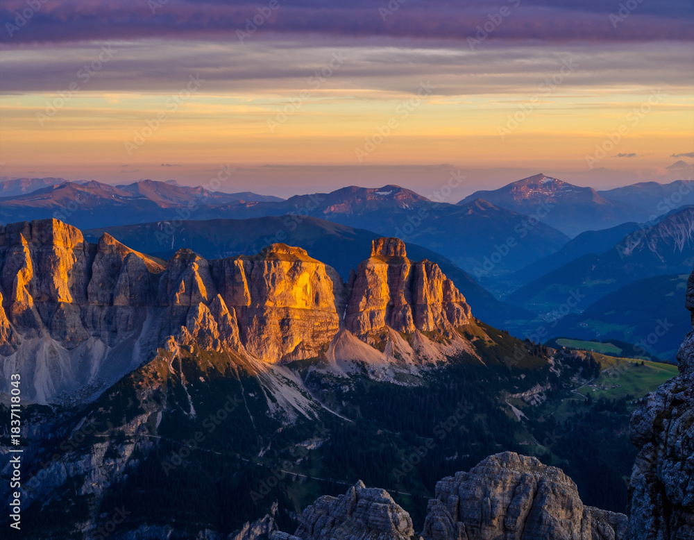 Fototapeta premium Majestic mountain range bathed in warm sunset light. Inspiring landscape for travel, adventure, or nature themes. Perfect for editorial or commercial use.