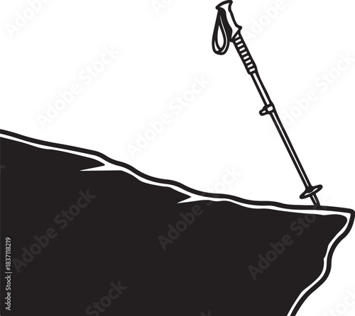 Trekking pole on a cliff edge Keywords: trekking pole, hiking stick, cliff, edge, mountain, rock