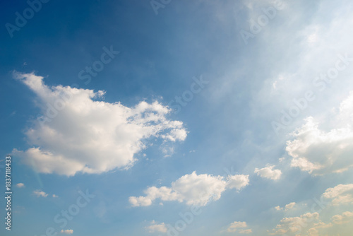 beautiful blue sky and white fluffy cloud horizon outdoor for background.