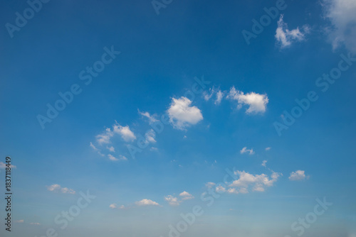 beautiful blue sky and white fluffy cloud horizon outdoor for background.