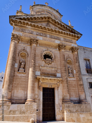 Ostuni, Italy - July 30, 2025: Facade of the Church of  Maria Santissima del Carmine, Confraternity of Carmine. Ostuni, called The White City. Province of Brindisi, Apulia, Puglia, Italy, Europe
