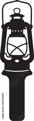 Silhouette of an old oil lantern oil lamp kerosene lamp