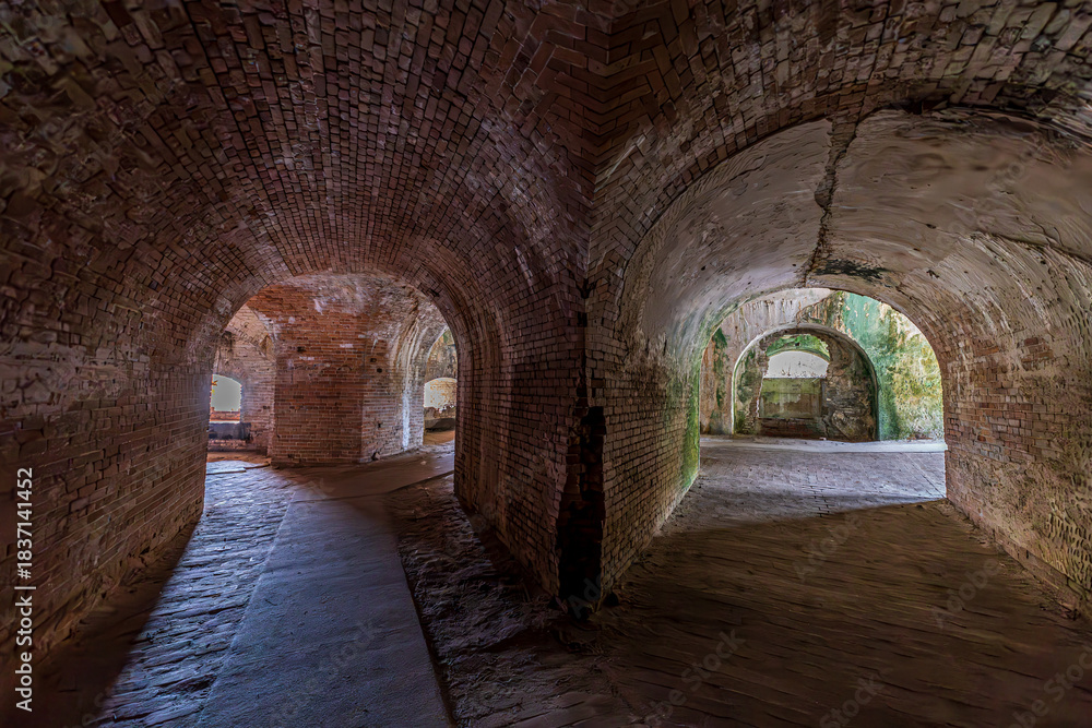 Obraz premium Weathered brick arches at Fort Pickens in Pensacola, Florida