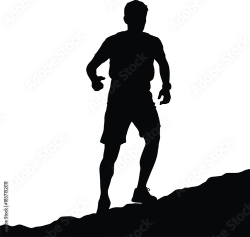 Silhouette of a determined male runner ascending a steep rocky incline against a bright white background