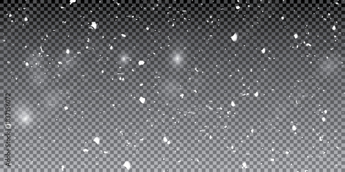 Falling snowflakes out of focus on transparent background for overlay blending mode. Snowing, snowfall, snow on black, selective focus