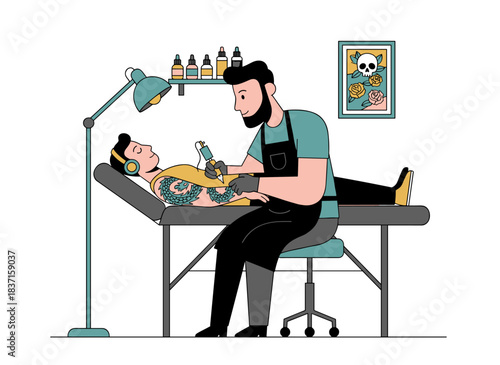 Professional tattoo master working with a client