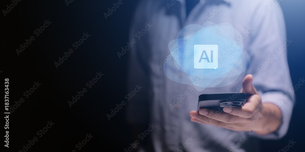 © arneaw - Person uses laptop interacting with AI virtual assistant. AI graphic overlay laptop keyboard. Concept of AI prompt engineering, LLM. Person types on keyboard to communicate with virtual
