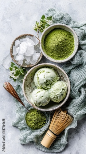 Matcha ice cream with green tea powder and ice cubes on a rustic table