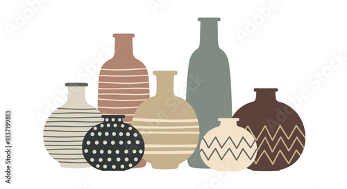 A collection of stylish ceramic vases and pots in various shapes and sizes with modern patterns for home decoration.