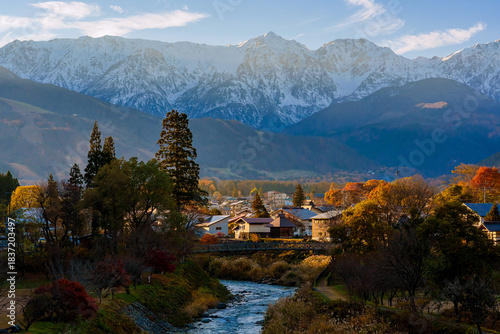 Beautiful scenery of Oide Park in Hakuba Village, Nagano, gently brushed by the warm evening sunlight amid the autumn season.