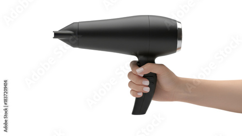 Woman's hand holding a modern black blow dryer isolated on white background
