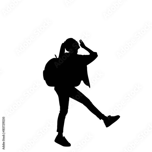 Silhouette of a young female student or traveler with a backpack striking a dynamic, joyful pose with one leg raised and one hand near her head