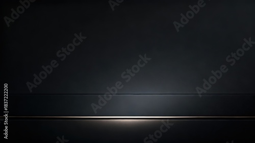 Charcoal gray matte wall and glossy stage podium with strong low-key light accentuating the lower illuminated edge.
