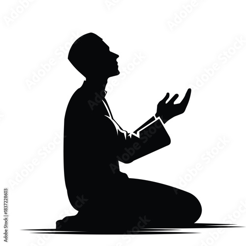 Silhouette of a Muslim Man in Prayer