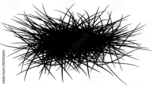 Silhouette of grass blades forming a dense, abstract shape with sharp points and organic curves.