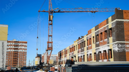 Construction site of an apartment building in winter.