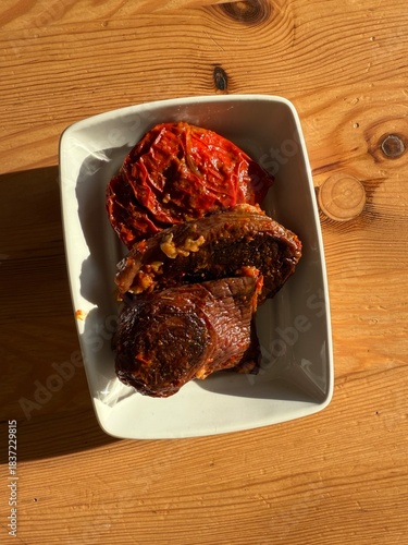 Dried eggplant stuffed with rice, tomato and olive oil known as dolma.