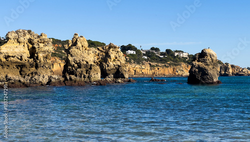 Rocky seashore. View of Praia da Vigia beach in Albufeira, Portugal, Europe