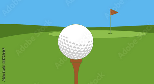 A close-up view of a white golf ball resting on a brown tee on a green golf course with a flag in the background.