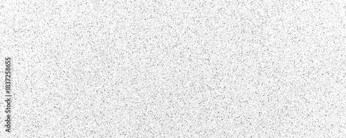 Black textured background with subtle white speckles and a gradient effect from bottom to top image