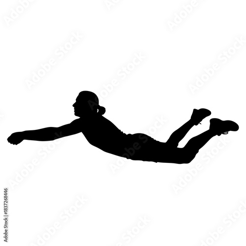 Dynamic silhouette of a volleyball player diving for the ball, showing athletic skill and determination in a high-energy moment of competitive sport