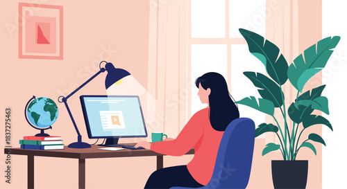 A young woman works or studies from home at her desk on a computer in a comfortable and cozy room with a desk lamp and plants.
