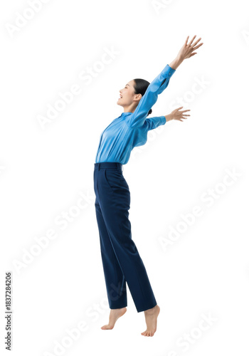 Young east asian woman in professional sky-blue attire dynamically celebrating success, arms raised overhead, isolated full-length on transparent high-key studio background, concept of professional