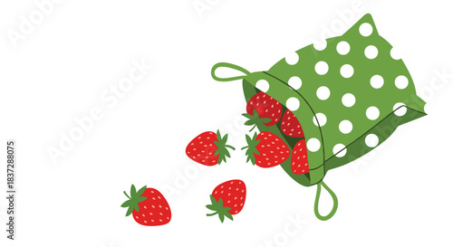 Fresh red strawberries spilling from a green and white polka dot reusable fabric bag with space for text on the left side.
