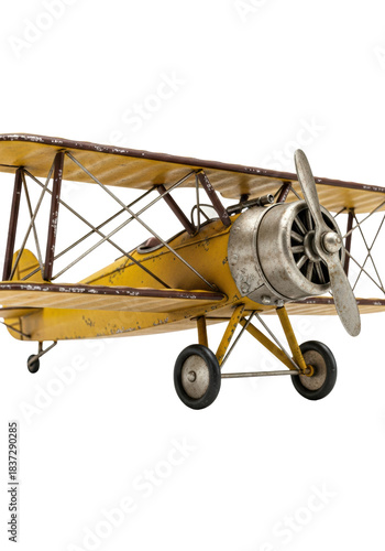 Wallpaper Mural highly detailed, distressed vintage metal toy biplane model, faded yellow paint, angled as if banking mid-flight, isolated on transparent background. concept of profound nostalgia and childhood Torontodigital.ca