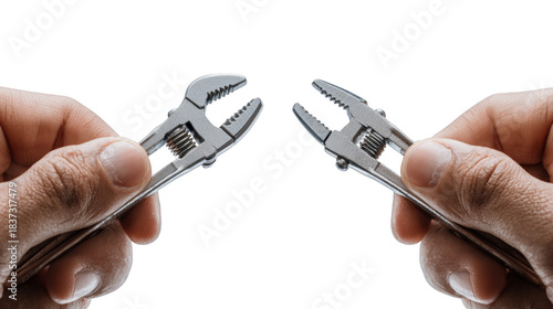 Two Adjustable Wrenches Facing Each Other, Precision Tools in Hands on Black Background