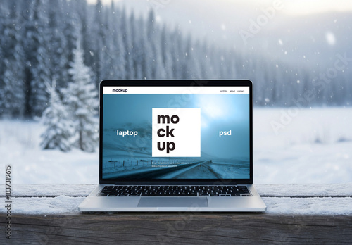 Laptop in winter scene mockup