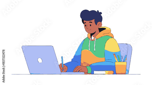 Young man studying with laptop and notebook.
