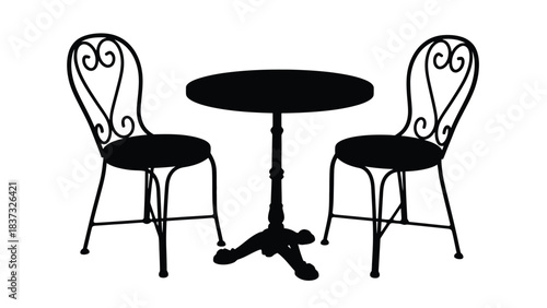 Elegant black silhouette of a bistro table and two ornate chairs