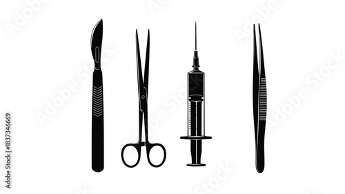 A collection of black surgical instruments including scalpels scissors and a syringe
