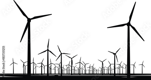 Silhouette of a wind farm with multiple turbines against a bright sky