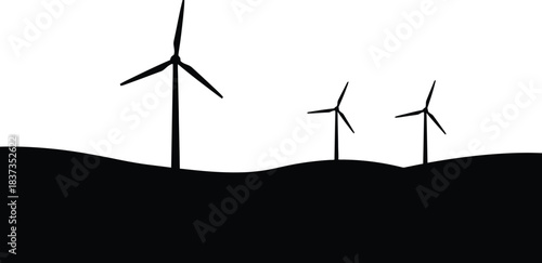 Silhouette of wind turbines against a bright horizon representing clean energy solutions