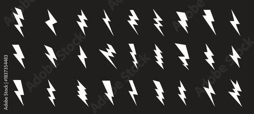 Set of sharp white lightning bolt silhouettes on a dark background, featuring multiple dynamic strike shapes. High-contrast graphic icons ideal for energy, power, storm, or electric-themed designs.