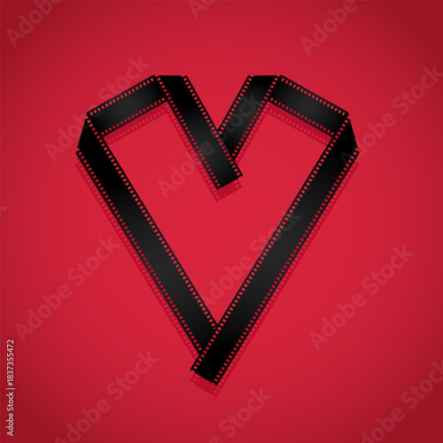 Film strip folded into a heart shape on a red background. Vector illustration