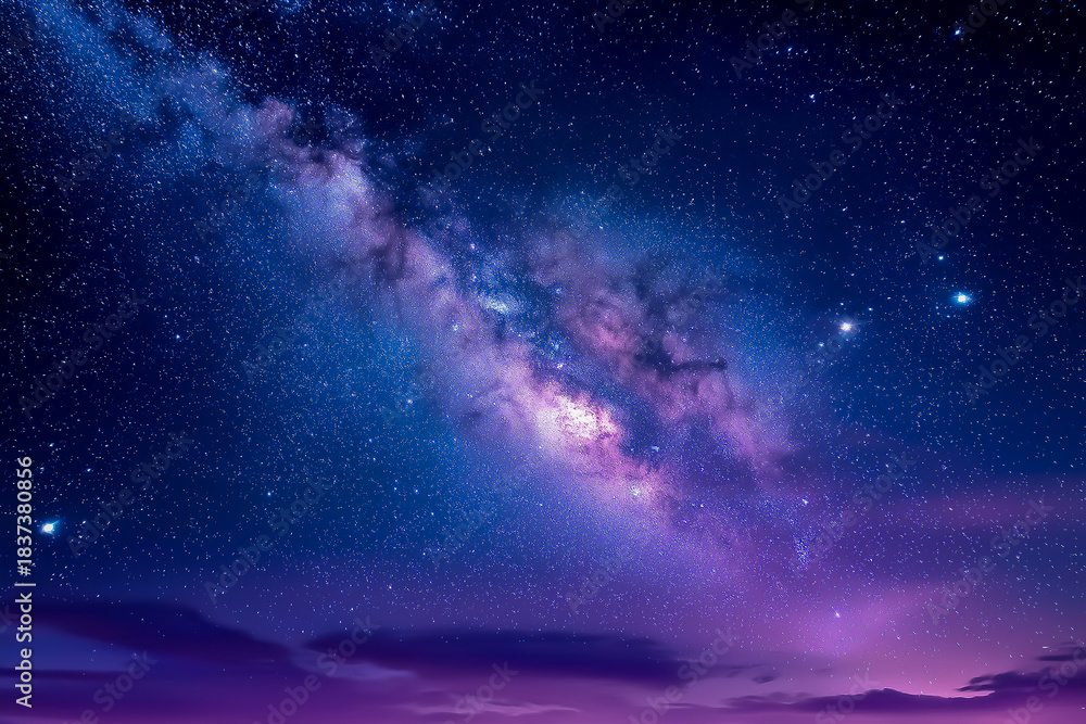 Fototapeta premium Night sky features a mesmerizing Milky Way galaxy with brilliant stars and colorful hues, capturing the essence of cosmic wonder and the beauty of the universe